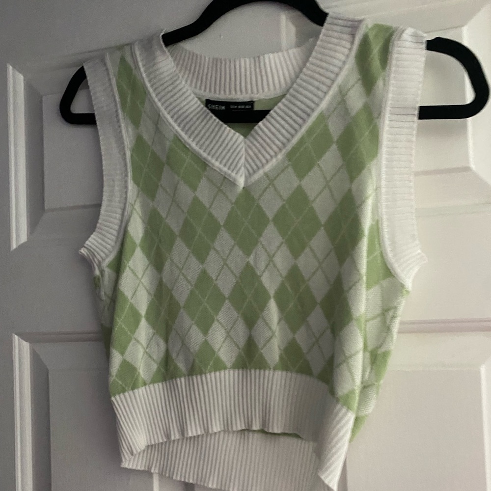 green sweater vest